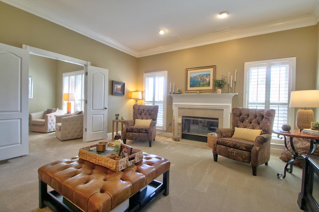 living room with a fireplace with flush hearth, light carpet, ornamental molding, and a healthy amount of sunlight