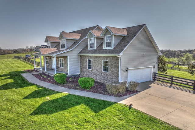 1105 Locust Fork Rd, Stamping Ground, KY 40379 - view of side of home with an attached garage, a lawn, driveway, and fence