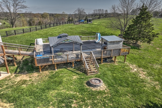 1105 Locust Fork Rd, Stamping Ground, KY 40379 - exterior space with stairway, a rural view, a fire pit, fence, and a wooden deck