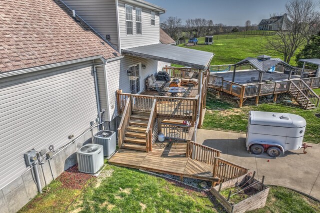 1105 Locust Fork Rd, Stamping Ground, KY 40379 - wooden terrace featuring stairway, a yard, and central AC