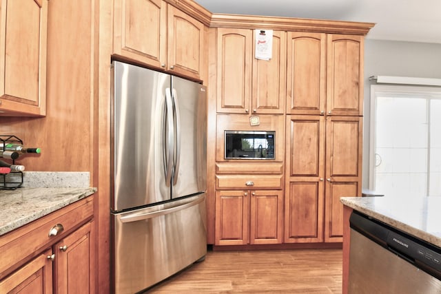 1105 Locust Fork Rd, Stamping Ground, KY 40379 - kitchen with light stone countertops, light wood-type flooring, and appliances with stainless steel finishes