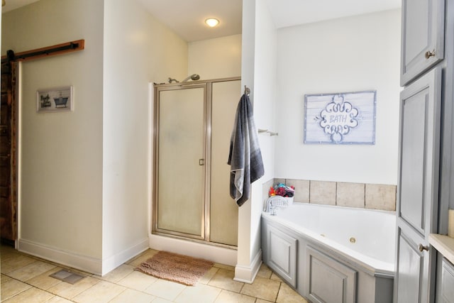 1105 Locust Fork Rd, Stamping Ground, KY 40379 - bathroom with baseboards, tile patterned floors, a whirlpool tub, and a stall shower
