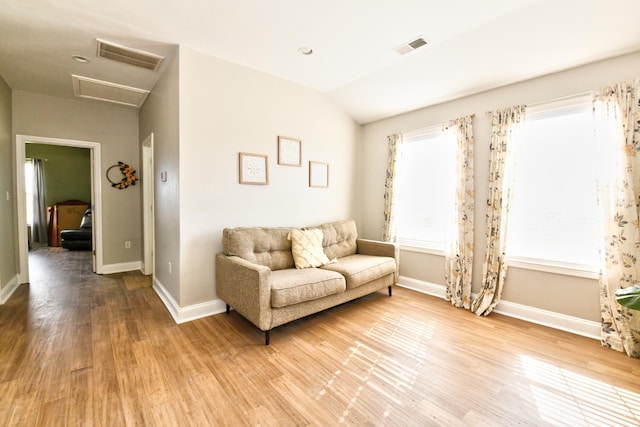 1105 Locust Fork Rd, Stamping Ground, KY 40379 - living area with baseboards, wood finished floors, and visible vents