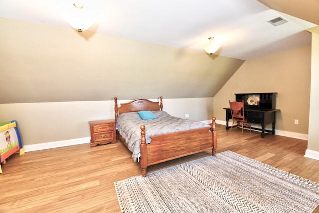 1105 Locust Fork Rd, Stamping Ground, KY 40379 - bedroom featuring baseboards, wood finished floors, and visible vents