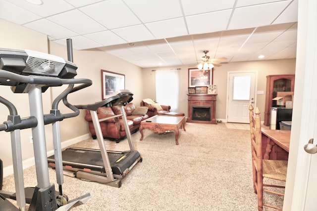 1105 Locust Fork Rd, Stamping Ground, KY 40379 - exercise area with a fireplace, a paneled ceiling, baseboards, and carpet