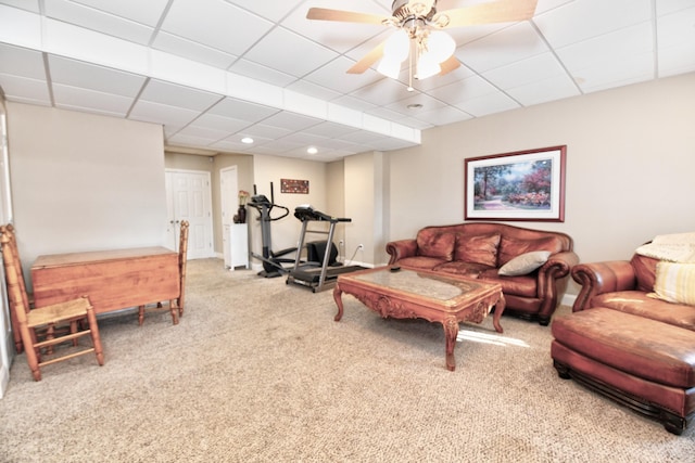 1105 Locust Fork Rd, Stamping Ground, KY 40379 - living area with ceiling fan, baseboards, a drop ceiling, and carpet