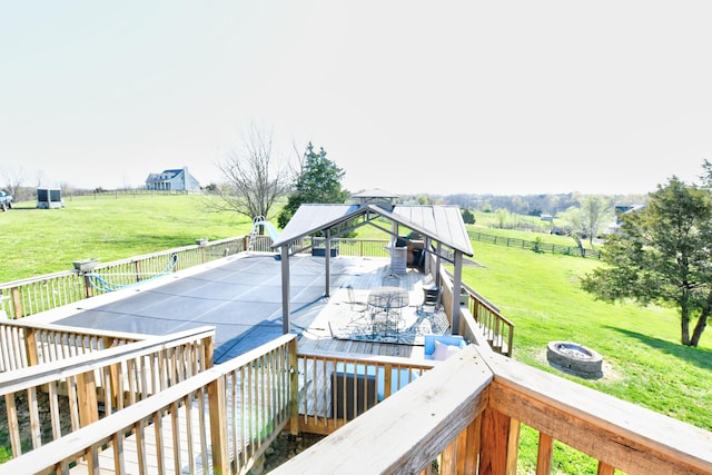 1105 Locust Fork Rd, Stamping Ground, KY 40379 - wooden terrace with fence, a rural view, a lawn, a fire pit, and a gazebo