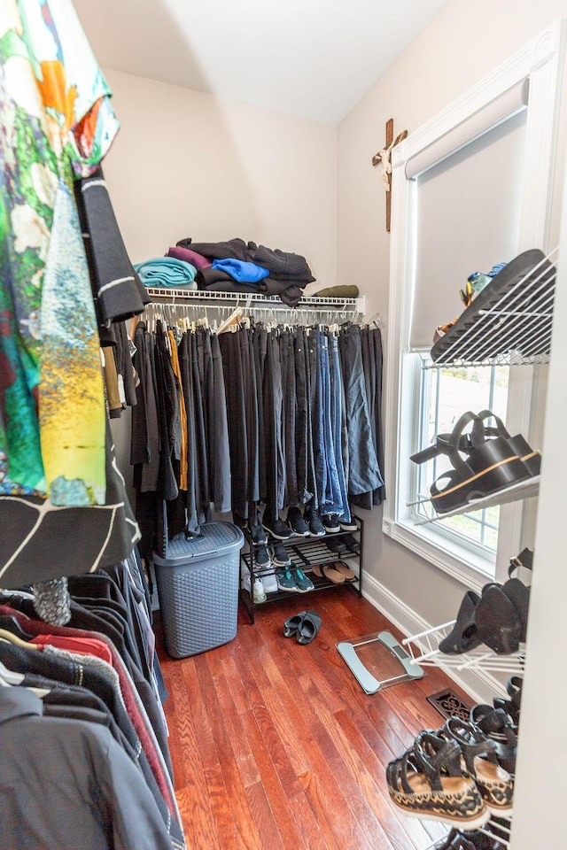 spacious closet with wood finished floors