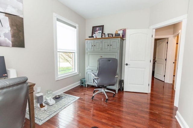 home office featuring baseboards and dark wood-style floors