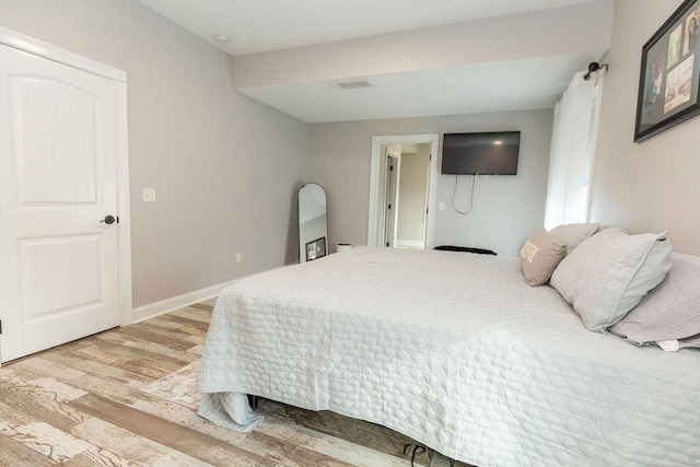 bedroom featuring light wood-type flooring