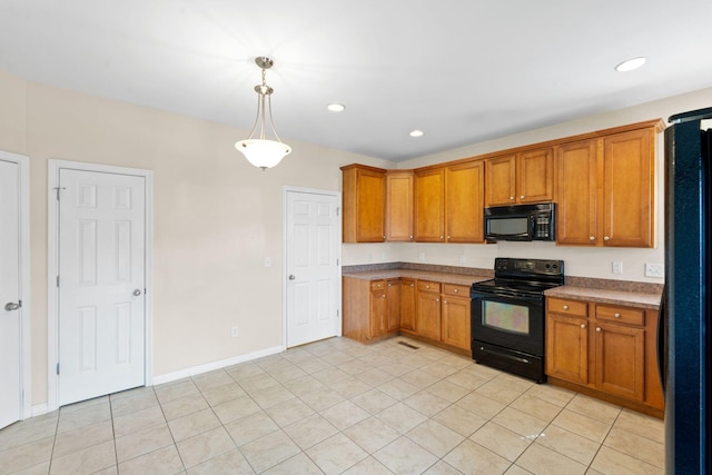 325 Long Branch Ln, Lexington, KY 40511 - kitchen with black appliances, brown cabinetry, decorative light fixtures, recessed lighting, and light tile patterned floors