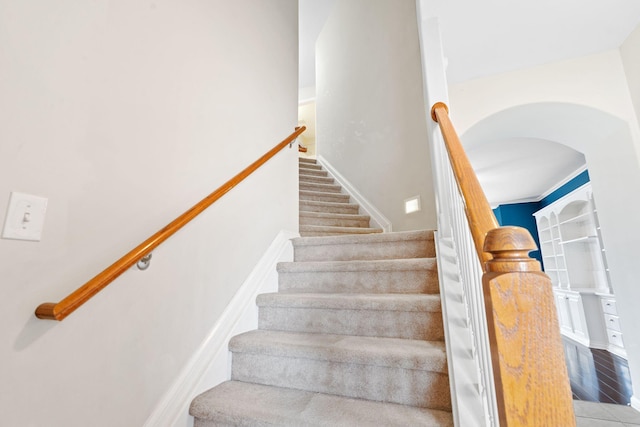 325 Long Branch Ln, Lexington, KY 40511 - staircase featuring arched walkways and baseboards