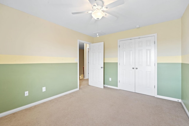 325 Long Branch Ln, Lexington, KY 40511 - unfurnished bedroom with baseboards, carpet floors, a closet, and a ceiling fan
