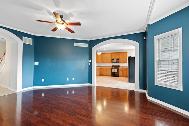 325 Long Branch Ln, Lexington, KY 40511 - unfurnished living room featuring ceiling fan, light wood-style flooring, crown molding, baseboards, and arched walkways