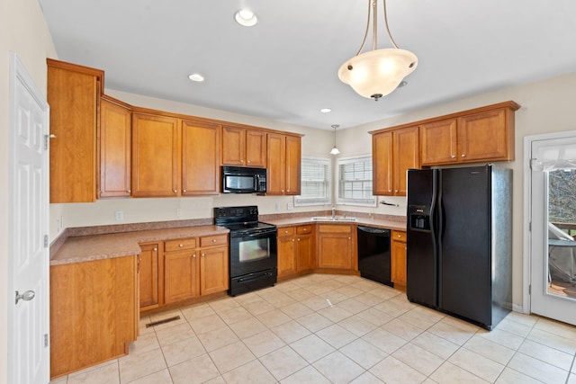 325 Long Branch Ln, Lexington, KY 40511 - kitchen featuring black appliances, brown cabinets, light countertops, and recessed lighting