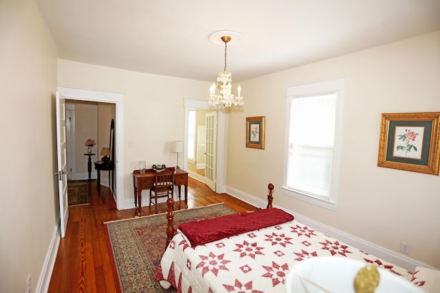 113 Olde Potomac Ave, Winchester, KY 40391 - bedroom with baseboards, an inviting chandelier, and wood finished floors