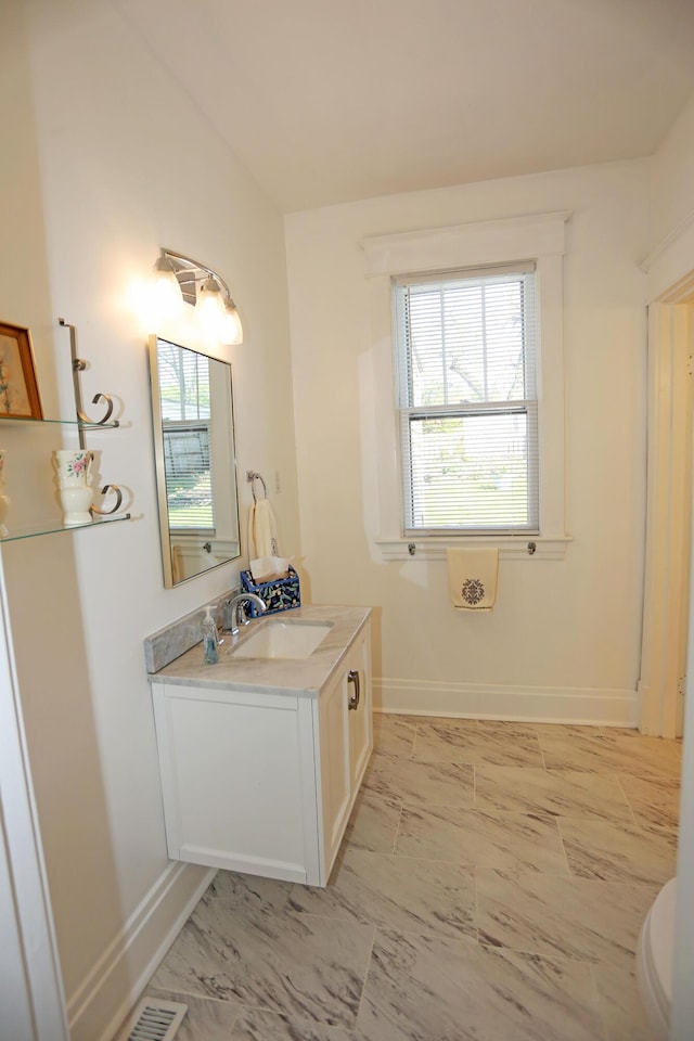 113 Olde Potomac Ave, Winchester, KY 40391 - bathroom featuring baseboards, marble finish floor, and vanity