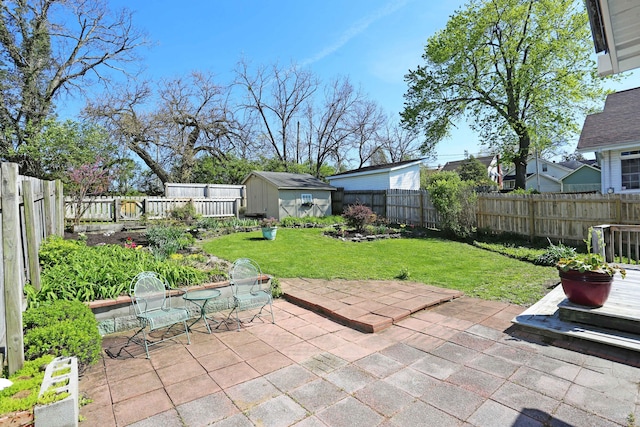 113 Olde Potomac Ave, Winchester, KY 40391 - view of patio / terrace with an outbuilding, a shed, and a fenced backyard