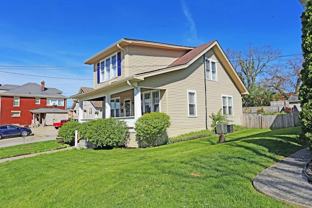 113 Olde Potomac Ave, Winchester, KY 40391 - view of property exterior featuring a lawn, fence, and central AC