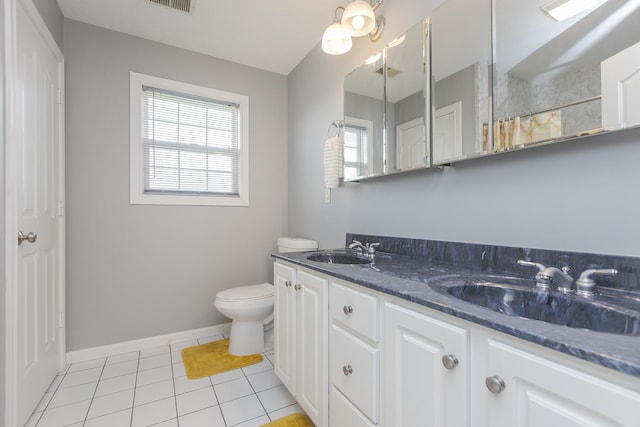 full bathroom featuring tile patterned flooring, plenty of natural light, and a sink