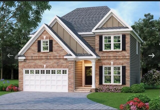 151 Village Park Dr, Georgetown, KY 40324 - view of front of home with brick siding, driveway, a front lawn, and a garage