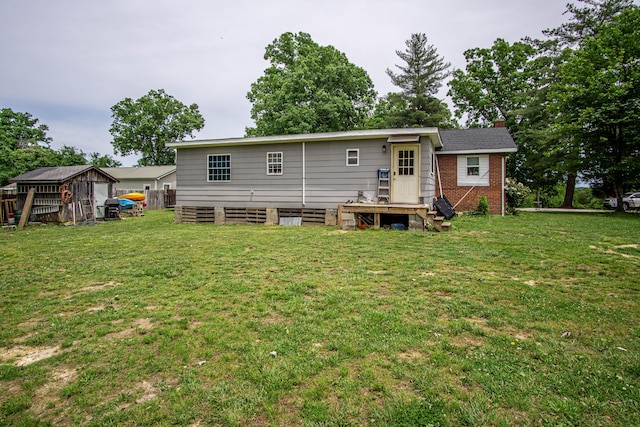 20 Hemlock Subdivision Rd, Williamsburg, KY 40769 - rear view of property featuring a chimney, a yard, and brick siding