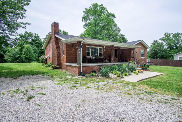 20 Hemlock Subdivision Rd, Williamsburg, KY 40769 - view of front of house featuring a chimney and brick siding