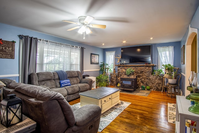 20 Hemlock Subdivision Rd, Williamsburg, KY 40769 - living room featuring ceiling fan, a wood stove, and hardwood / wood-style flooring