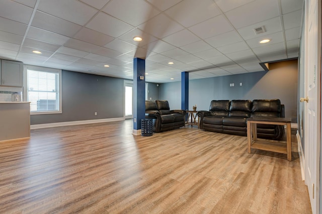 5141 Tristin Way, Catlettsburg, KY 41129 - living area featuring visible vents, a paneled ceiling, baseboards, and light wood-type flooring