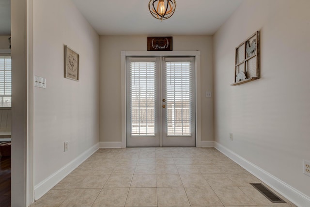 5141 Tristin Way, Catlettsburg, KY 41129 - entryway with baseboards, french doors, light tile patterned flooring, and visible vents