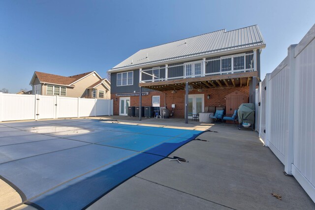 5141 Tristin Way, Catlettsburg, KY 41129 - rear view of house with fence, a patio, french doors, a fenced in pool, and a gate