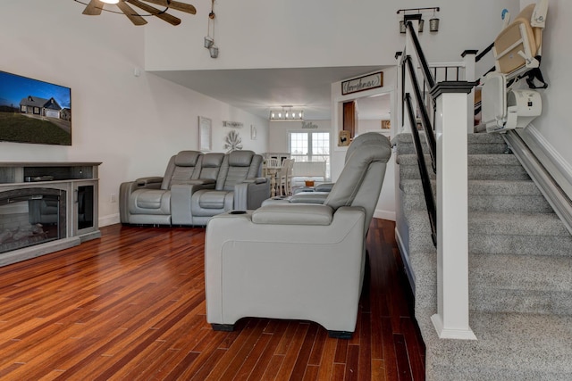 5141 Tristin Way, Catlettsburg, KY 41129 - living room with a glass covered fireplace, stairway, a ceiling fan, and wood finished floors