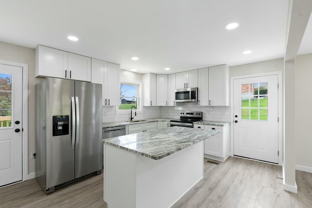 730 E Spencer Rd, Campton, KY 41301 - kitchen with light wood-type flooring, stainless steel appliances, a sink, and plenty of natural light