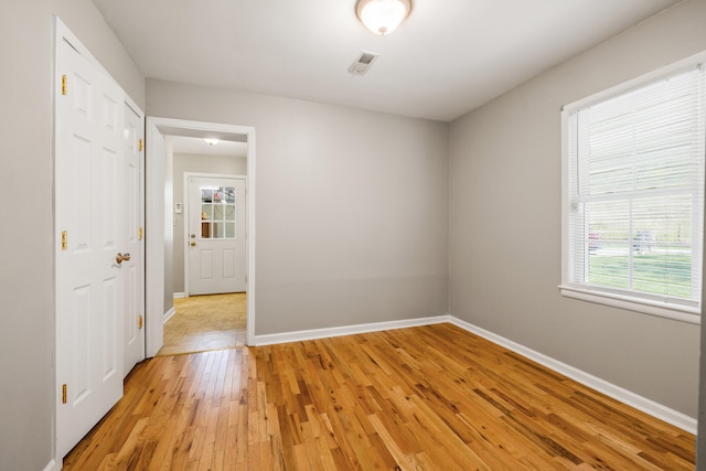 6473 Wildie Rd, Mount Vernon, KY 40456 - spare room with visible vents, baseboards, and light wood-style floors