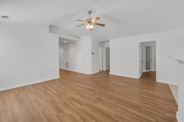 unfurnished room featuring light wood finished floors, baseboards, visible vents, and ceiling fan