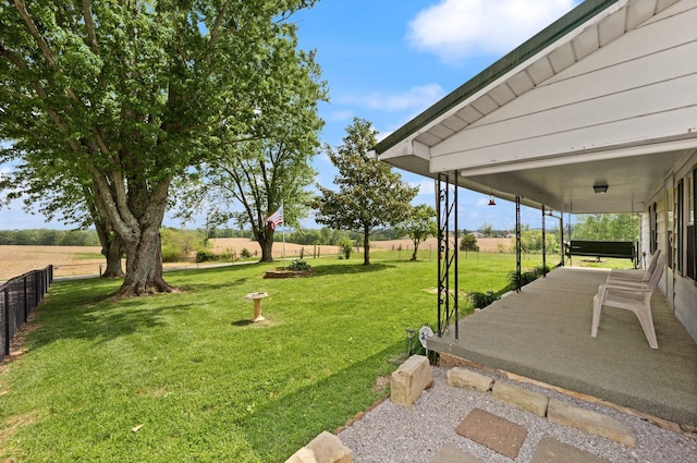 view of yard featuring fence