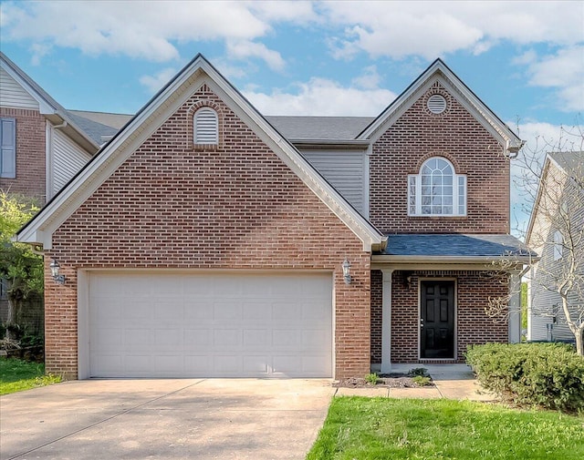 traditional home featuring brick siding, roof with shingles, driveway, and a garage