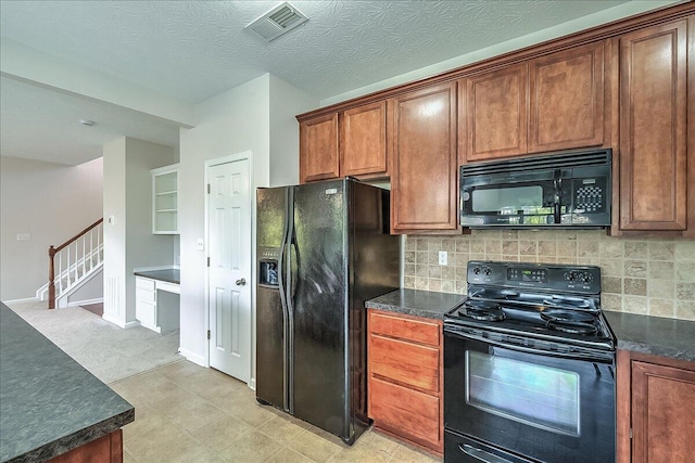 kitchen with black appliances, backsplash, visible vents, and baseboards