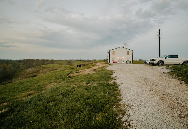 view of road with driveway