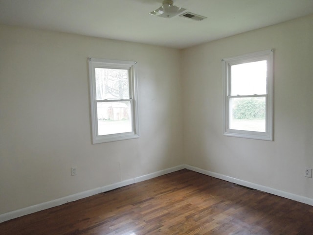 217 Dorothy Ave, Danville, KY 40422 - empty room featuring plenty of natural light, wood finished floors, visible vents, and baseboards