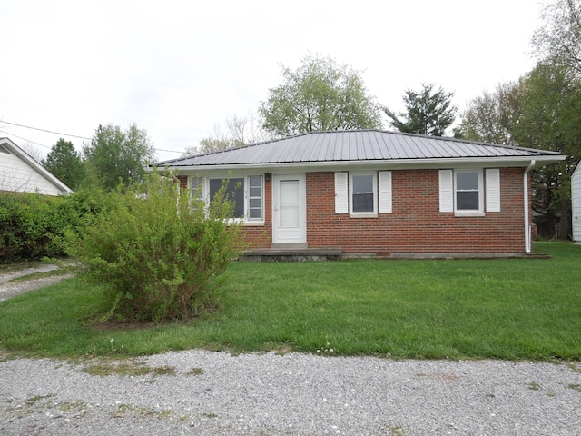 217 Dorothy Ave, Danville, KY 40422 - ranch-style house with brick siding, a front yard, and metal roof