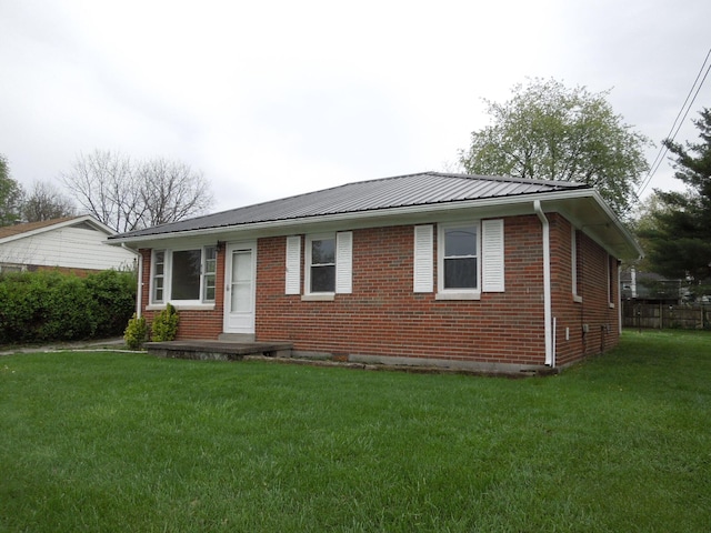 217 Dorothy Ave, Danville, KY 40422 - ranch-style home with a front lawn, brick siding, and metal roof