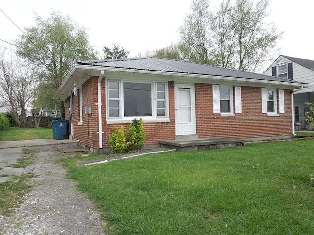 217 Dorothy Ave, Danville, KY 40422 - ranch-style home featuring a front lawn, brick siding, and metal roof