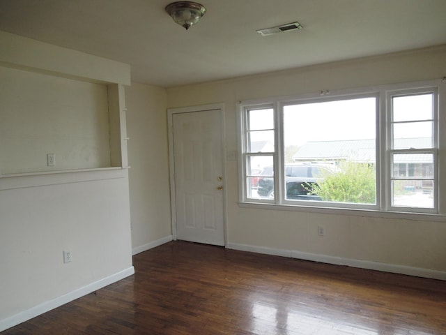 217 Dorothy Ave, Danville, KY 40422 - spare room featuring baseboards, dark wood-type flooring, and visible vents