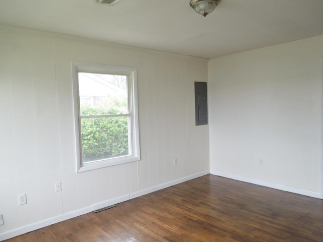 217 Dorothy Ave, Danville, KY 40422 - unfurnished room with baseboards, visible vents, dark wood-type flooring, and electric panel
