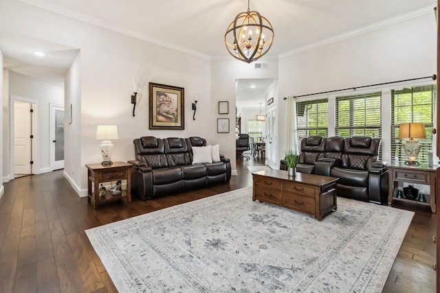 600 Avawam Dr, Richmond, KY 40475 - living area with dark wood-style flooring, a notable chandelier, visible vents, baseboards, and ornamental molding