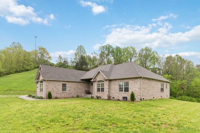 600 Avawam Dr, Richmond, KY 40475 - view of front of home featuring brick siding, roof with shingles, a front yard, and crawl space