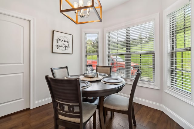 600 Avawam Dr, Richmond, KY 40475 - dining room with a notable chandelier, dark wood-style floors, and baseboards