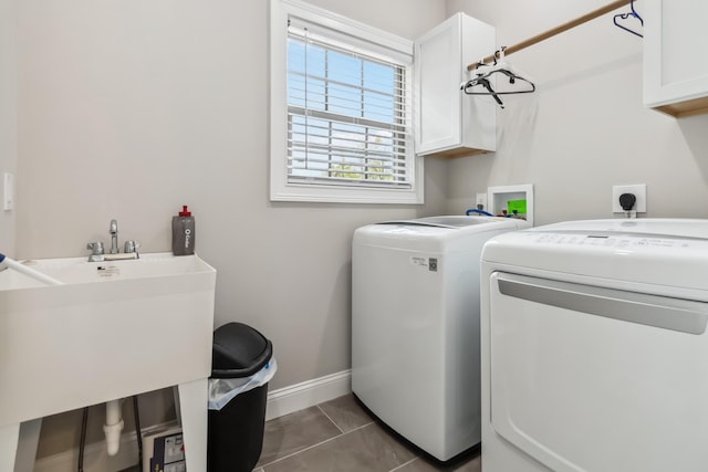 600 Avawam Dr, Richmond, KY 40475 - laundry area with washer and clothes dryer, cabinet space, and baseboards