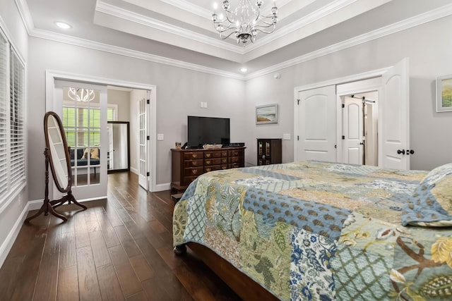 600 Avawam Dr, Richmond, KY 40475 - bedroom with an inviting chandelier, ornamental molding, baseboards, dark wood-type flooring, and a tray ceiling